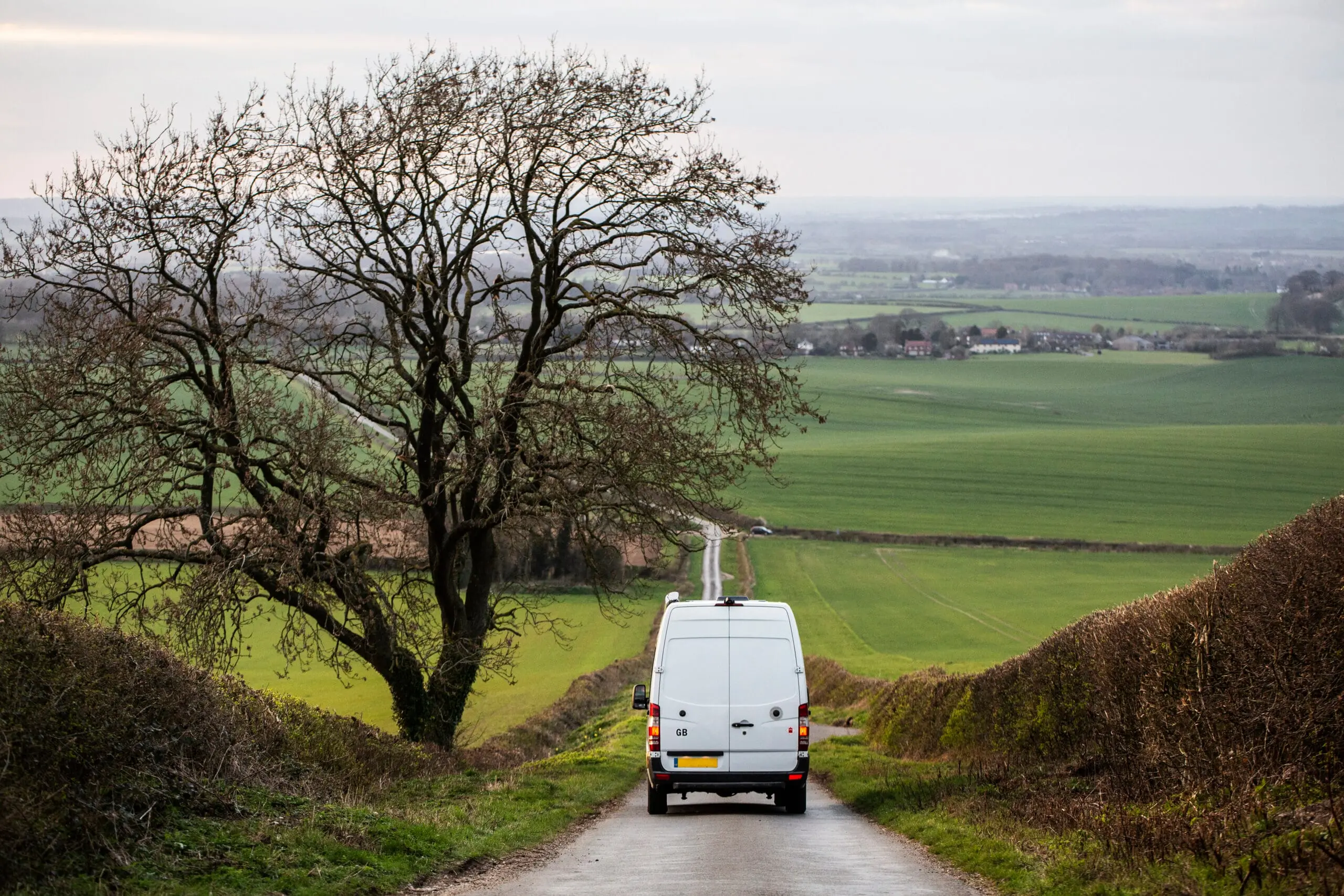 D1 training vehicle on a country lane representing careful minibus towing preparation